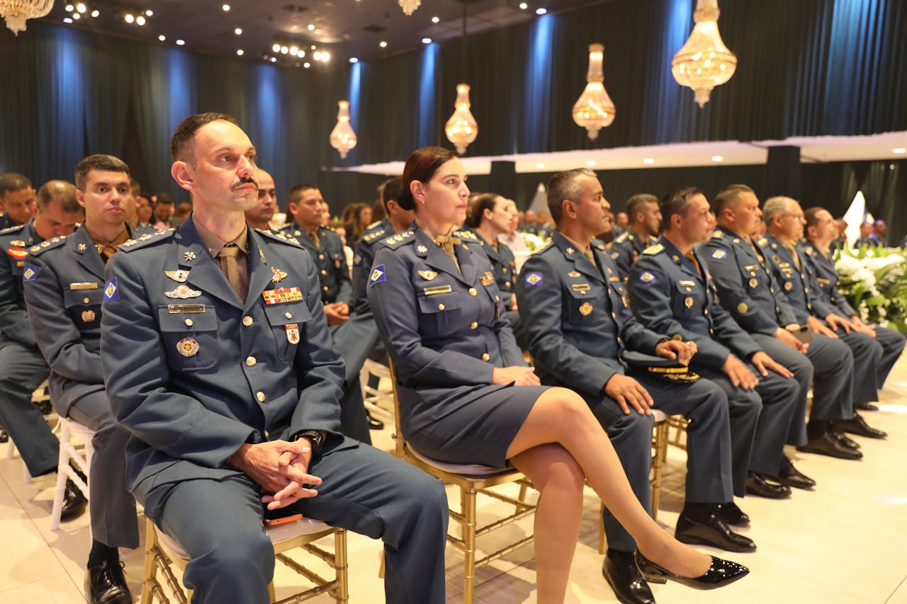 Formal military ceremony in Mato Grosso, Brazil featuring uniformed personnel.